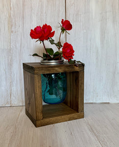 wooden box with mason jar and flowers